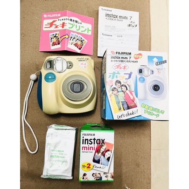 Máy chụp ảnh lấy liền Fujifilm Instax Mini 7 Cheki tặng kèm pin tiểu AA và 1 hộp film 10 tấm