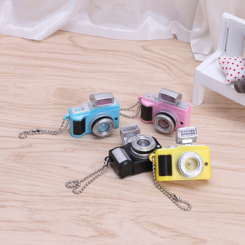 Móc chìa khóa hình máy ảnh có đèn led kèm nhạc vui nhộn