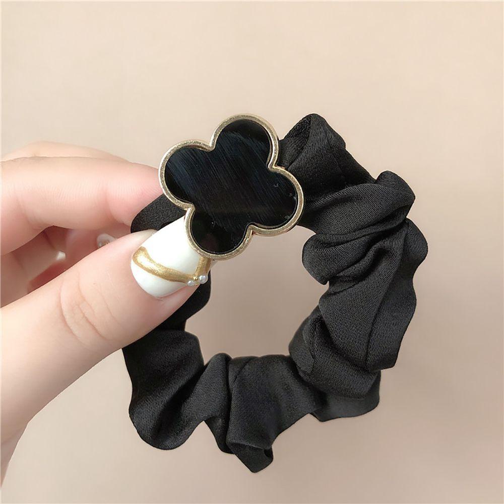 Dây Buộc Tóc Co Giãn Hình Cỏ Bốn Lá Bằng Hợp Kim Cho Nữ 2life