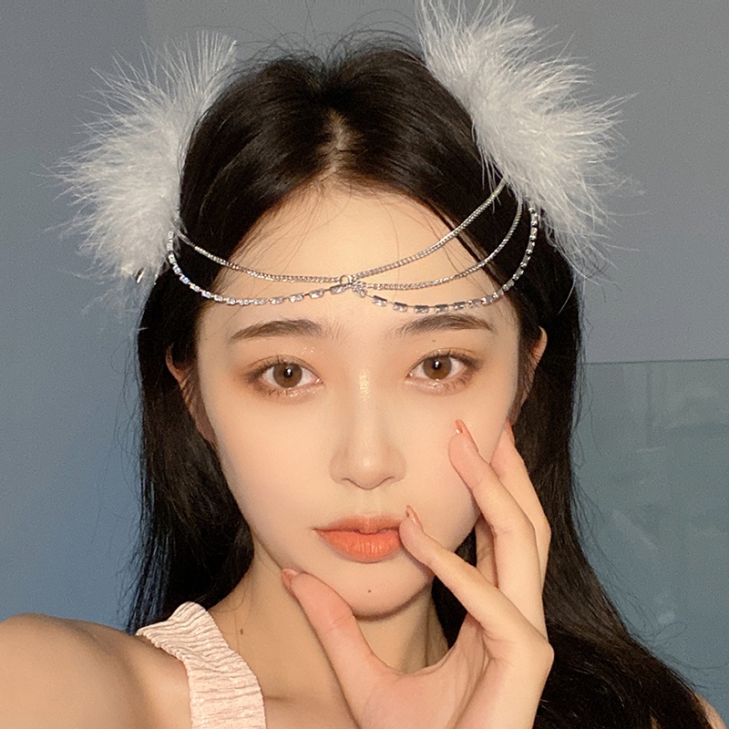 Băng đô cài tóc đính lông vũ trắng