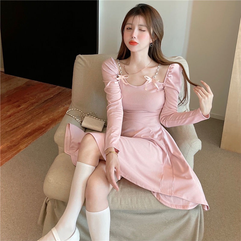 Long sleeved dress women's autumn decoration body temperament short skirt with thin waist and bow design sense, small and fluffy skirt