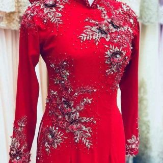 Áo dài cô dâu giúp cô dâu thêm xinh đẹp lỗng lẫy .