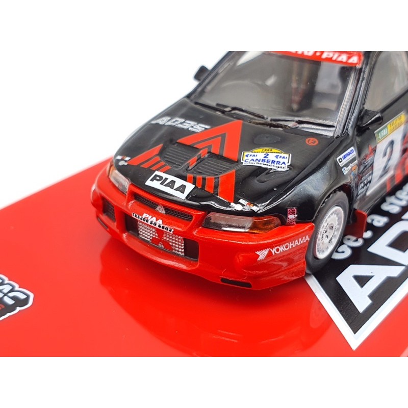 Xe Mô Hình Mitsubishi Lance Evolution VI Winner Rally of Canberra 1999 1:64 Tarmac Works (Đỏ Advan)