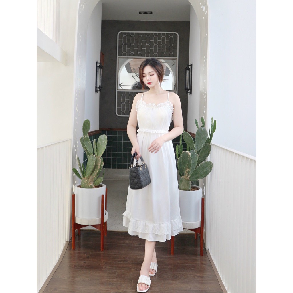 lụa may 2 lớp, có sẵn mút ngực, và dây đan chéo sau lưng