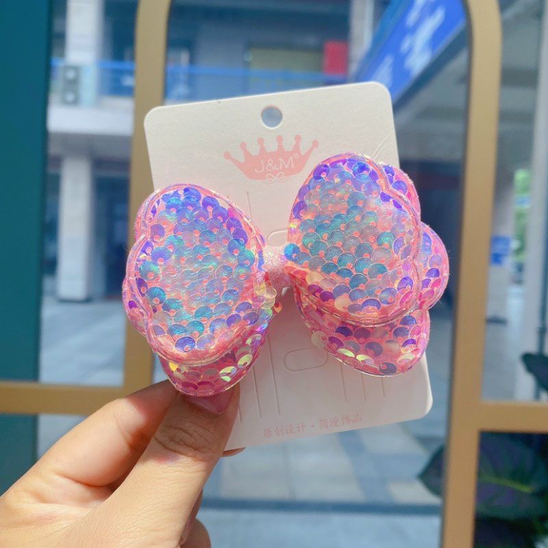 Kẹp tóc nơ đính kim sa xinh xắn cho bé