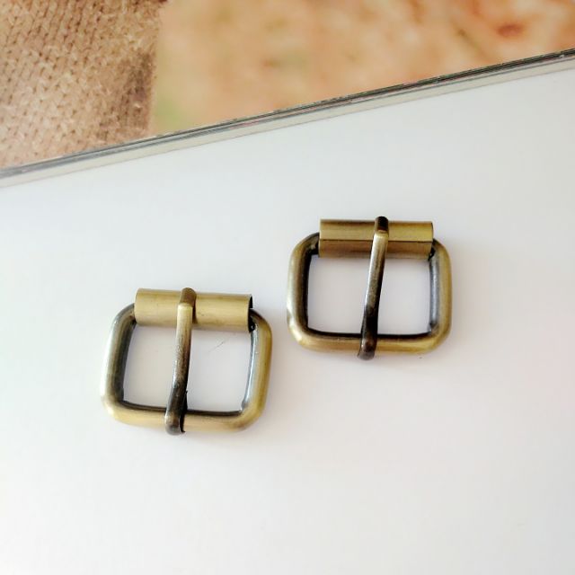 Khoá kim làm quai túi ví