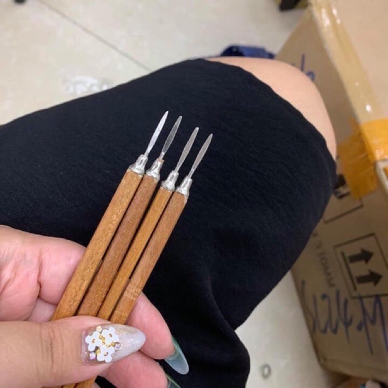 Lấy khoé cán gỗ nail