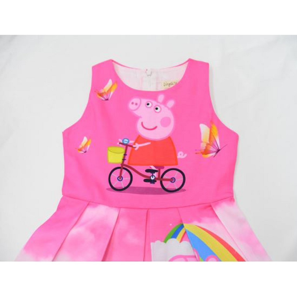 Đầm kate gân xếp ly họa tiết heo peppa pig đạp xe bé gái