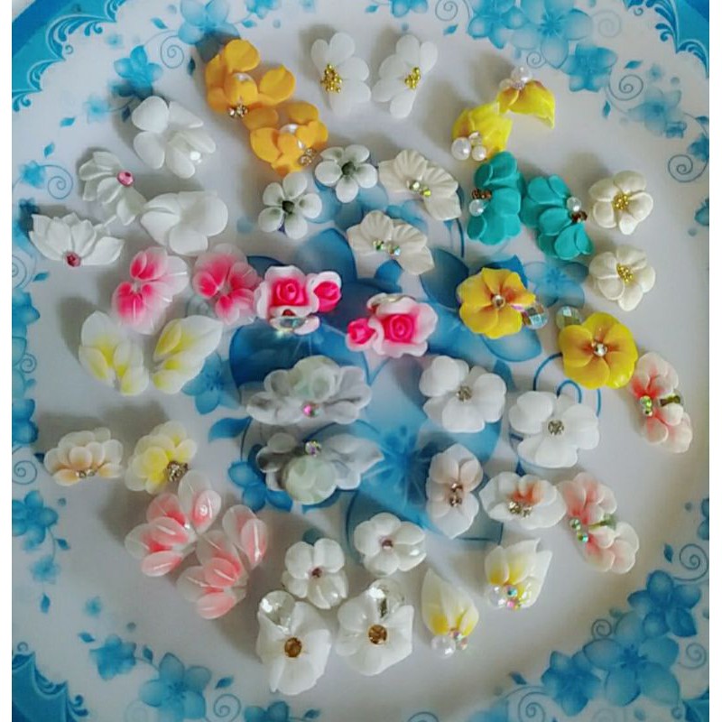 Hoa bột sét hoa 42 bông như hình .- Hình ảnh do shop tự chụp, hoa bột làm trên móng giả, vừa form móng thật, vừa form.