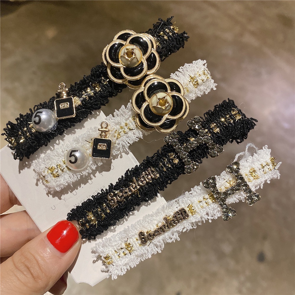 Kẹp tóc CHANEL đính đá sang trọng cho nữ