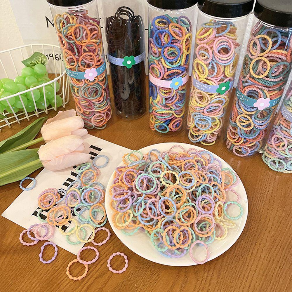Hộp 300 Dây Buộc Tóc Cao Su Co Giãn Nhiều Màu Sắc Dễ Thương Cho Bé