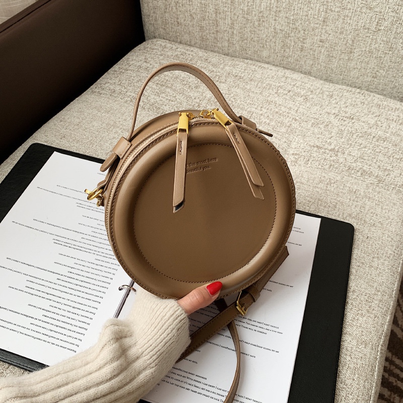 Korean niche design round cake simple retro handbag one shoulder under the bag women's apple small round bag