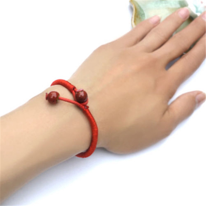 Vòng tay chỉ đỏ xỏ hột thời trang nam nữ