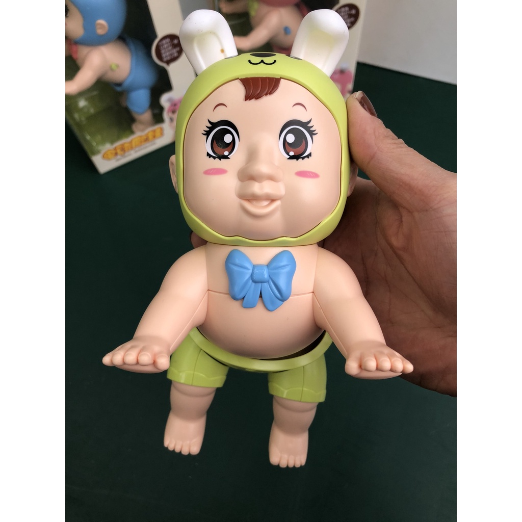 Búp bê em bé bò có nhạc vui nhộn và cử động được cho bé chơi