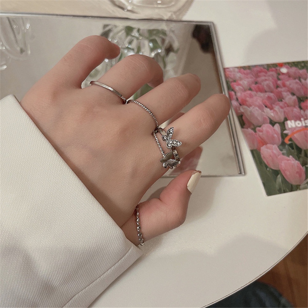 Bộ 4 Nhẫn Mở Hình Bướm Chuyển Động Màu Bạc Tối Giản Thời Trang Hàn Quốc Cho Nữ