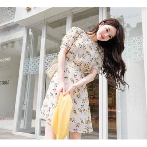 Oder Váy hoa vàng chiết eo