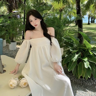 Đầm trắng dáng lửng trễ vai phối dây tay dài đầm xoè đi biển