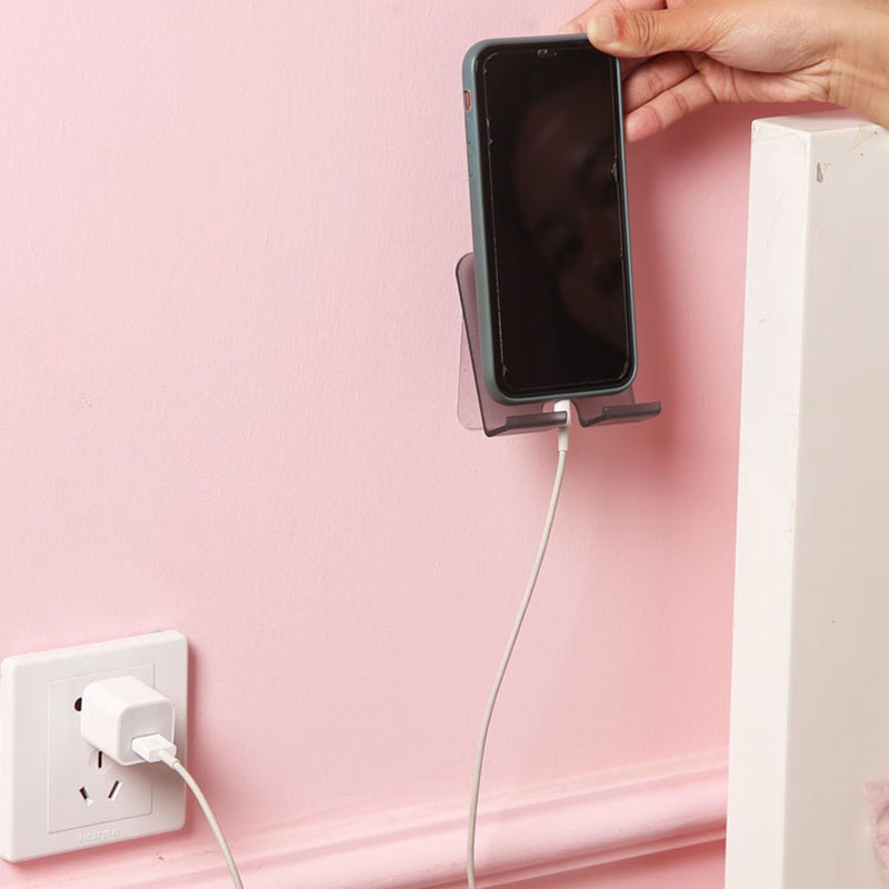 1 giá đỡ điện thoại gắn tường bằng nhựa 3 màu đa năng