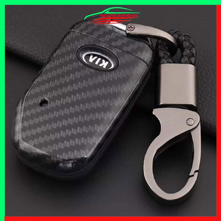Ốp khóa cacbon Kia K3 2022-2023 kèm móc khóa