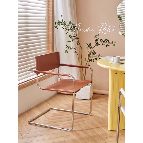 Ghế da yên Mr Arm chair khung kim loai cao cấp phong cách Bắc Âu