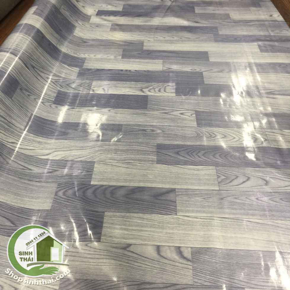 Thảm nhựa PVC simili trải sàn vân gỗ màu xám bóng