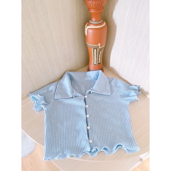 Áo len tăm hàng cúc ngọc cài