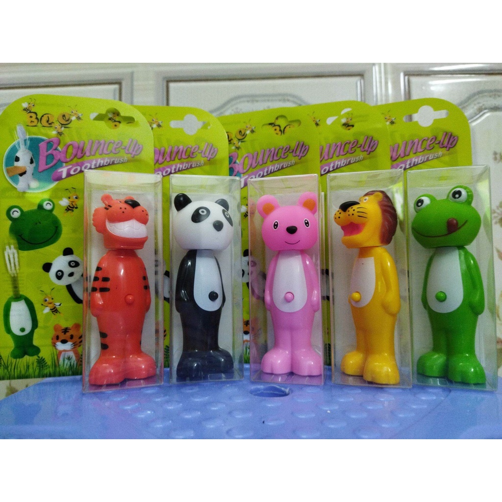 Bàn chải đánh răng trẻ em có nắp bật ngộ nghĩnh cho bé