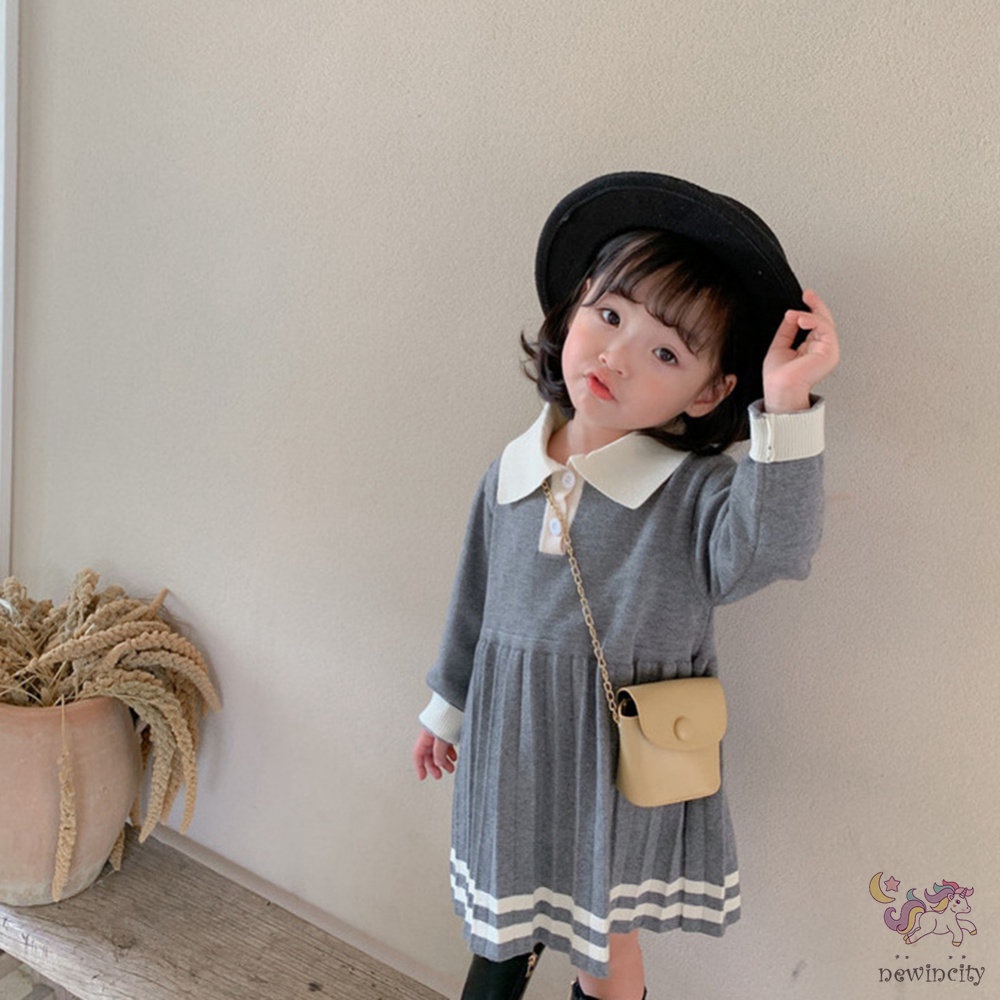 Đầm dài tay phối bèo nhún cho bé