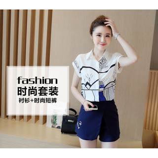 Áo sơ mi họa tiết + quần váy
