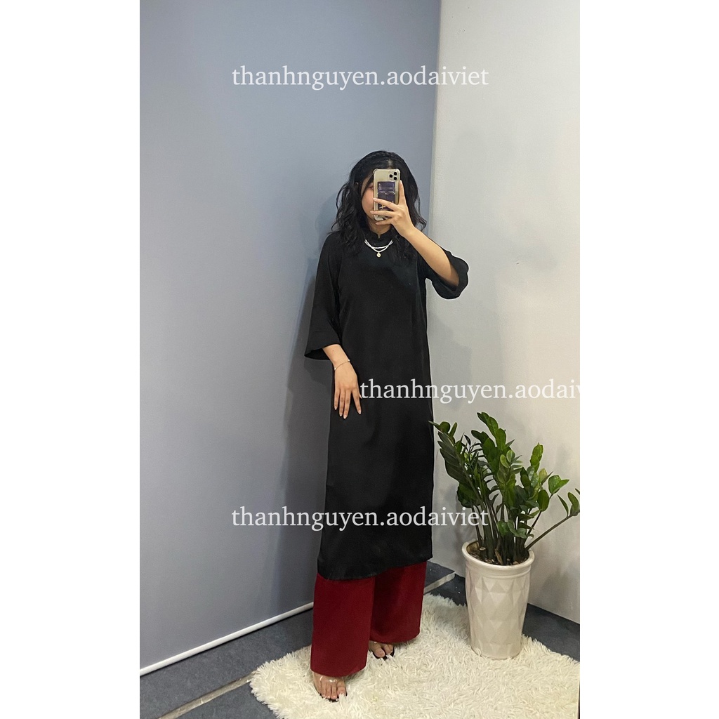 Áo dài đen cách tân tay loe lụa Ngọc Trai
