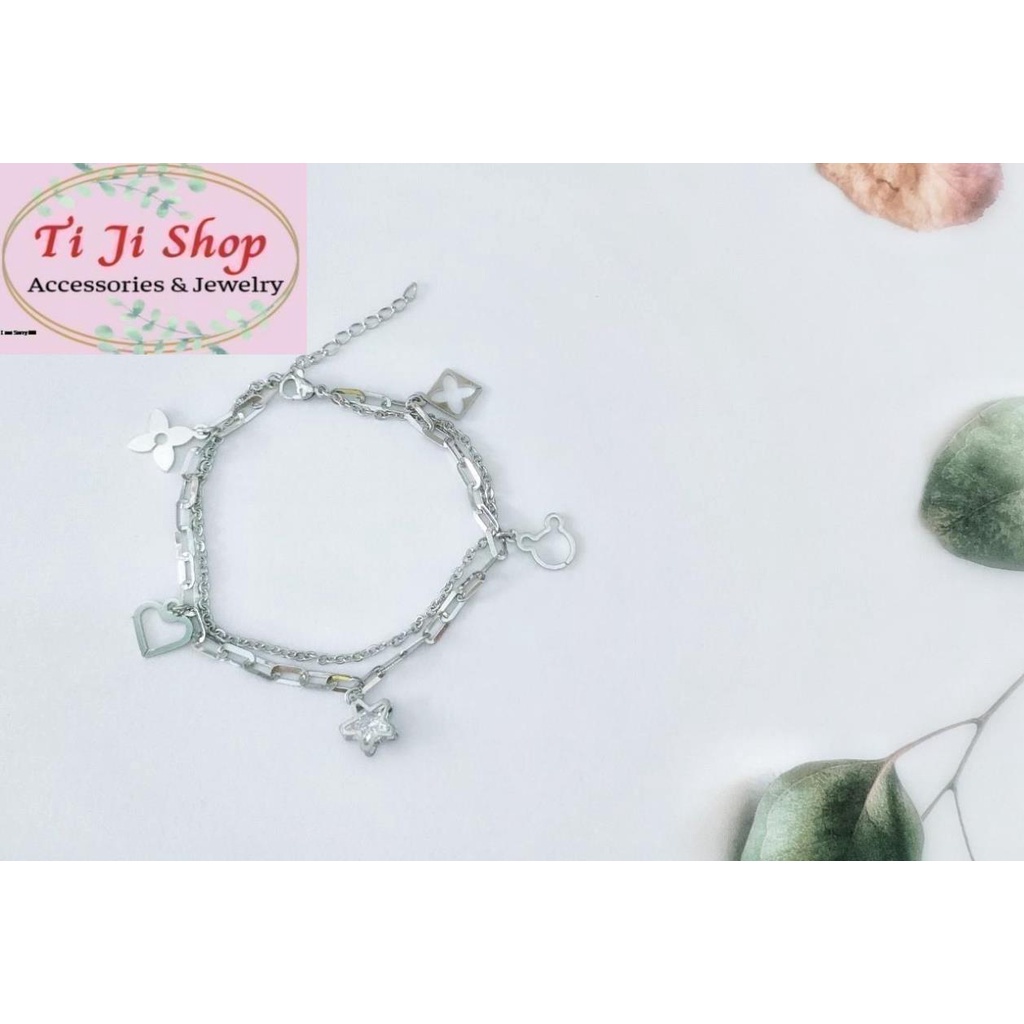 LẮC TAY NỮ INOX  2 TẦNG GẮN PHỤ KIỆN NGÔI SAO ĐÍNH ĐÁ ZICON