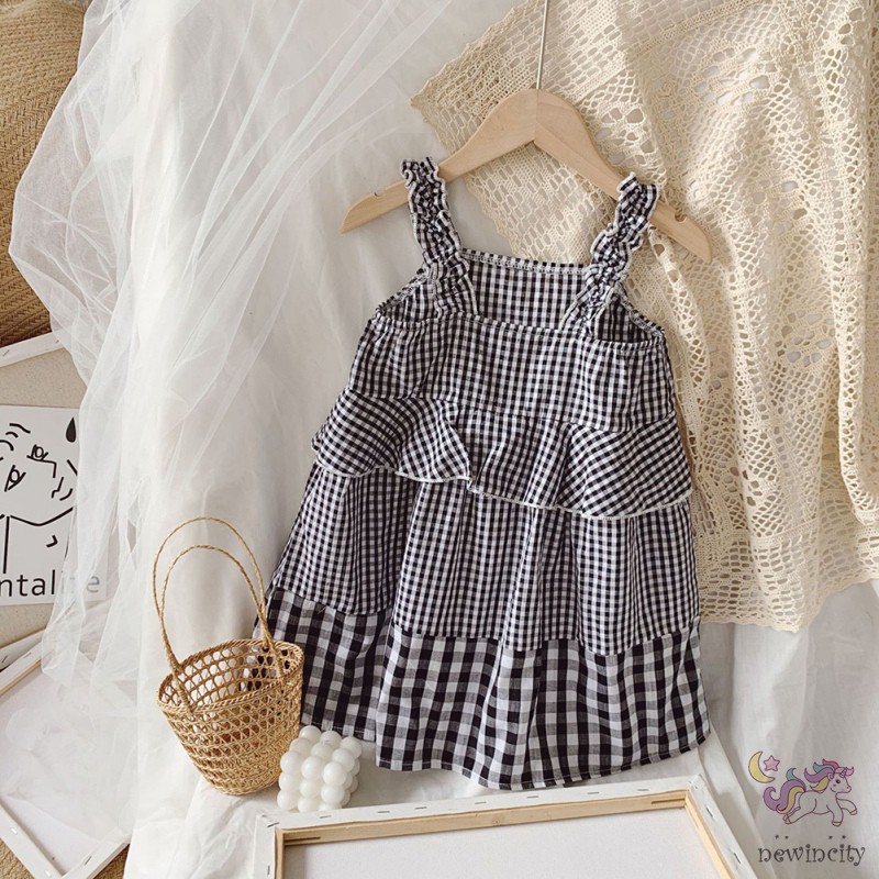 Đầm Yếm Kẻ Ca Rô Cho Bé