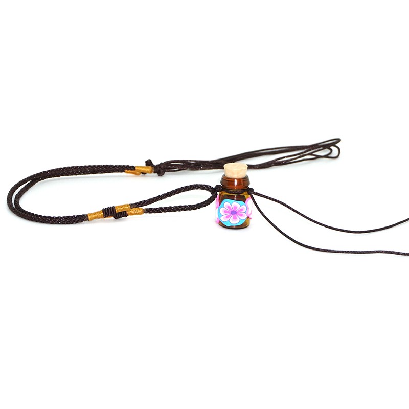 Tinh dầu trầm hương - lọ mini dùng để đeo cổ, vừa làm trang sức vừa có ý nghĩa phong thủy, kỵ tà, gió máy và hút may mắn