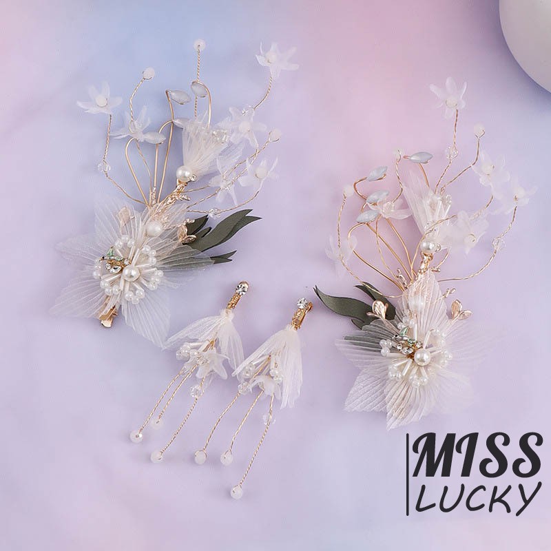 Khuyên tai và kẹp tóc cô dâu thời trang thanh tú