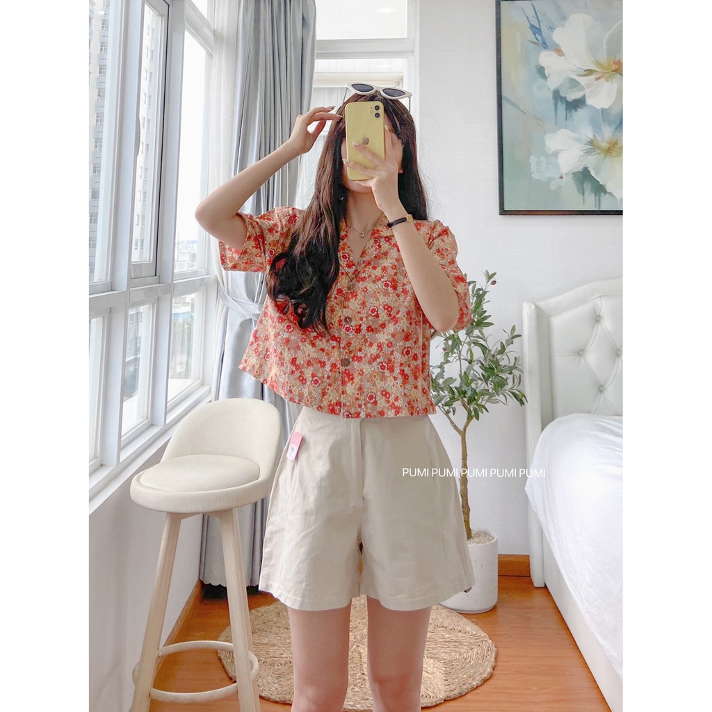 Áo SM hoa nút gỗ freesize Pumi