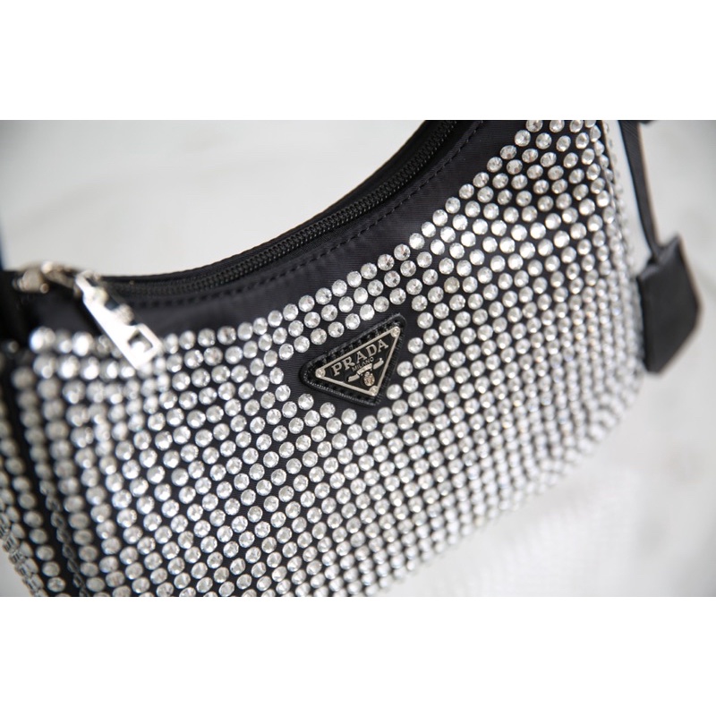 Túi Xách P RA DA Đá gắn cả 2 mặt ,tag da in