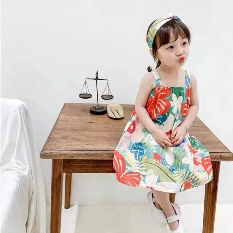 Đầm hoa phong cách công chúa hở lưng thời trang cho bé