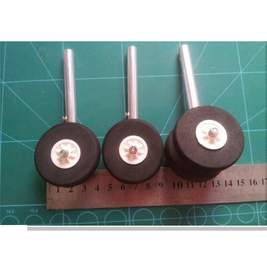 Bộ càng nhún lò xo - Càng đáp lò xo lốp PU hàng cao cấp