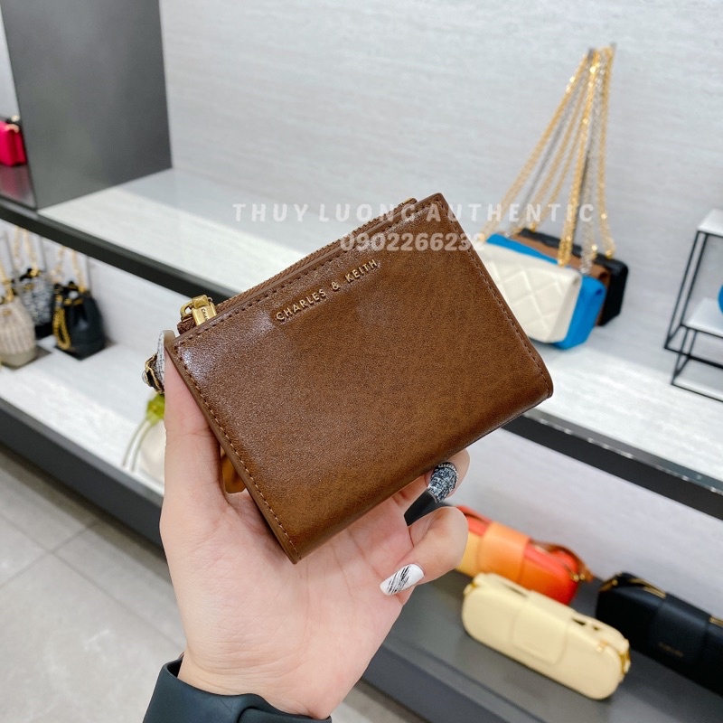Ví nữ Charles and Keith màu cam, nâu, kem