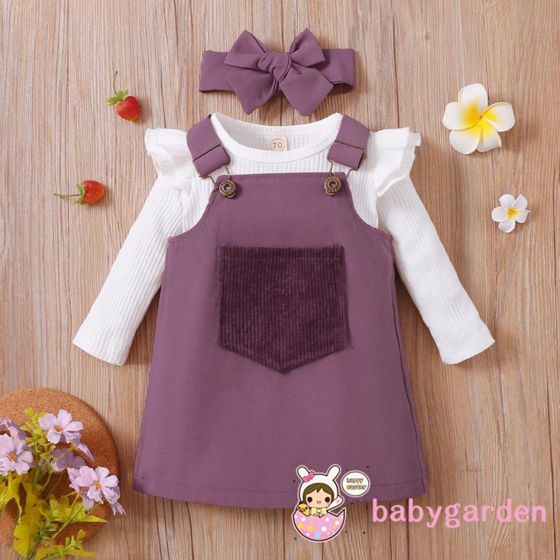 Bộ áo cổ tròn tay dài kiểu nhún bèo có nút gài phía dưới + váy yếm có túi phía trước + băng đô dành cho bé gái