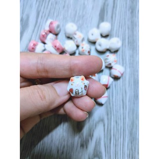 QT MÈO GỐM THẦN TÀI 2x1,5cm [HỎA TÓC]