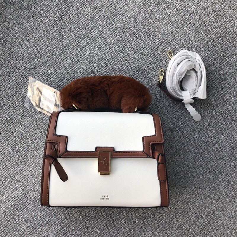 Túi lyn tay cầm lông