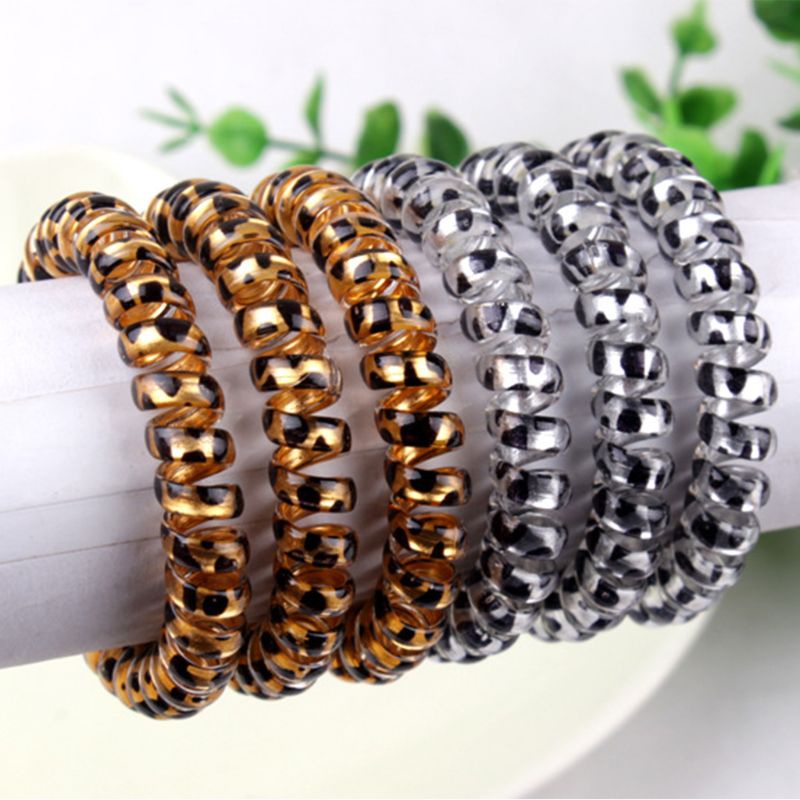 Dây Cột Tóc Lò Xo Bằng Nhựa Họa Tiết Da Báo 2 Màu Lấp Lánh Cho Nữ