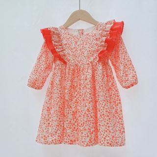 Váy cánh tiên hoa nhỉ đỏ.