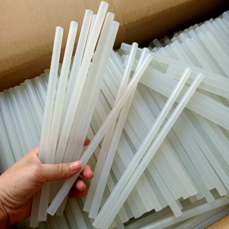 1 cây keo nến to kt: 1.1x25cm dùng cho súng/máy bắn keo to