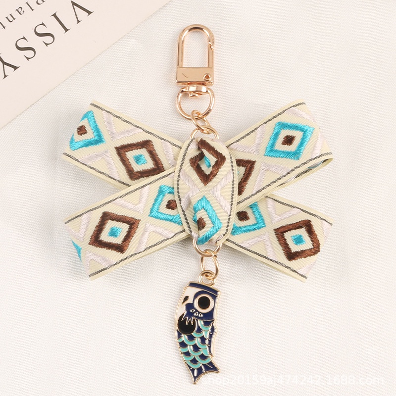 Móc khóa hình đám mây đính ngọc trai giả mới