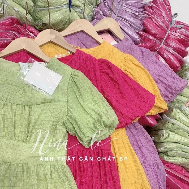 Đầm xốp nhún tay bồng phom xoè