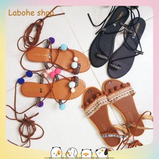 Giày sandal chiến binh cột dây viền thổ cẩm đính pom pom phong cách Boho