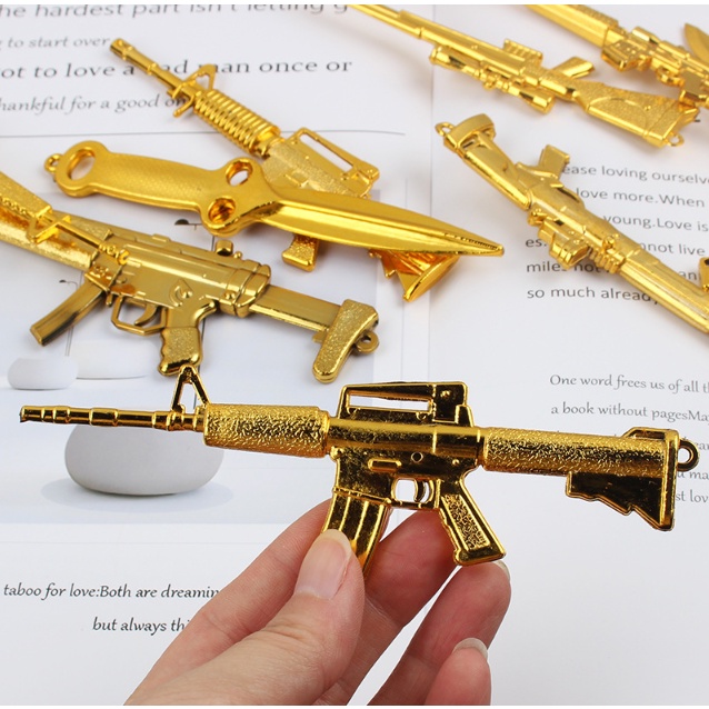Đồ chơi mô hình mini súng AK vàng có chỗ để móc móc khoá