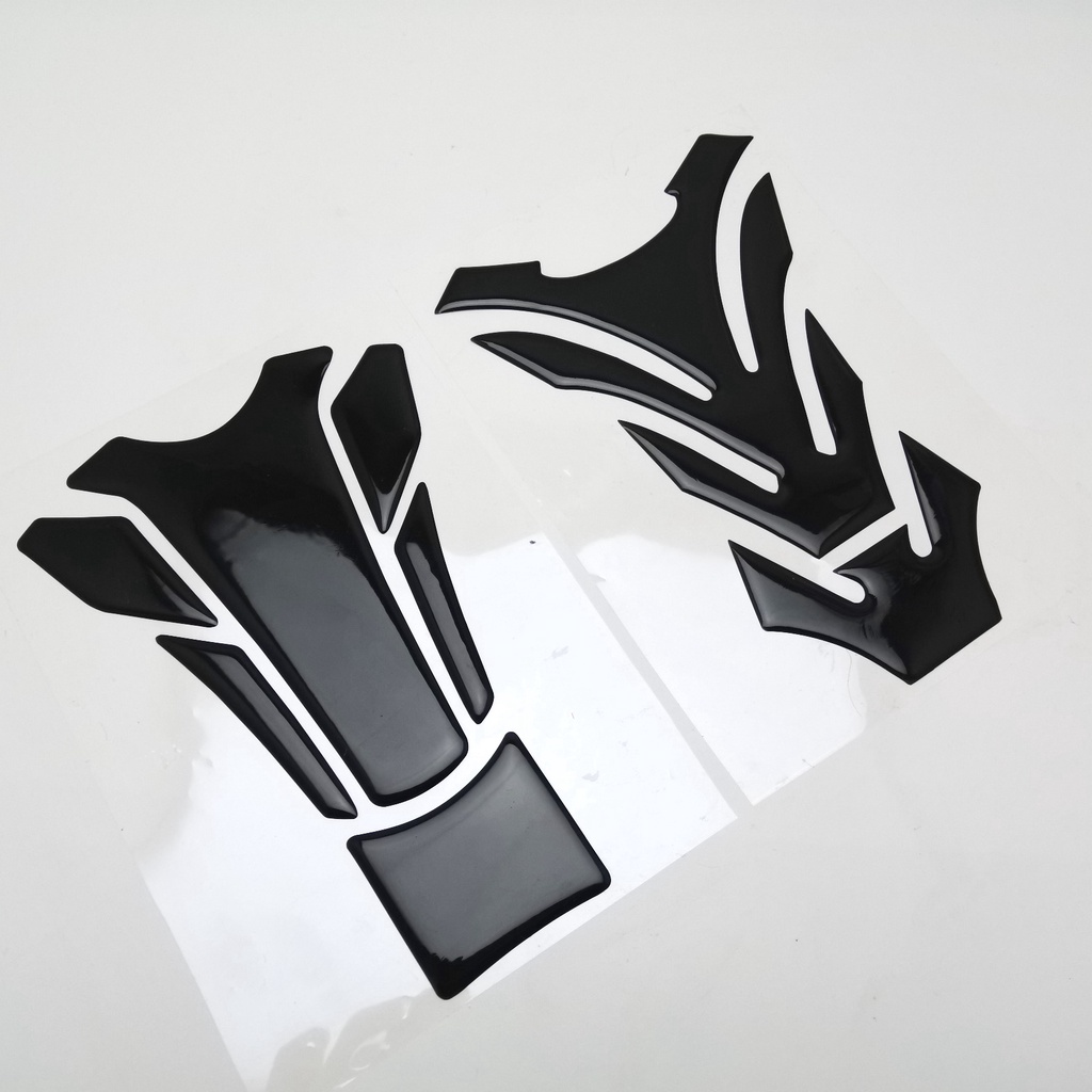 Set 2 miếng dán nắp bình xăng chống trượt màu đen trơn hình xương cá dành cho xe hơi